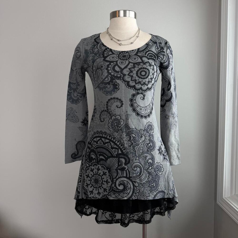 Grey and black paisley print long sleeve top with asymmetrical hem